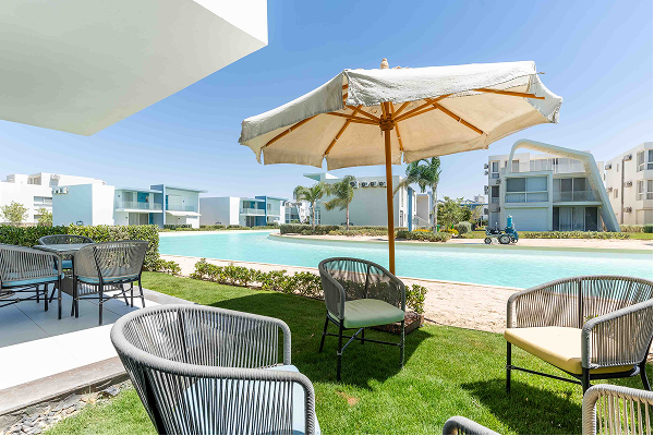 Pool, lounge chair and umbrella